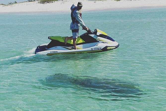 2 Hour Shell Island Jet Ski Dolphin Tour - Crossing St. Andrews Bay on one jet ski