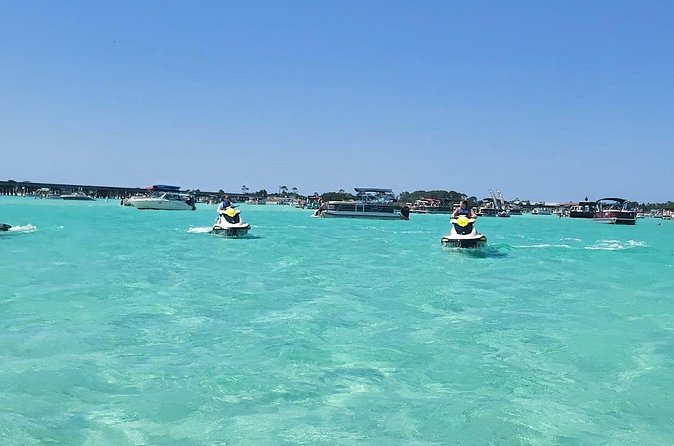 2 Passenger Jet Ski Dolphin Tour from Gilligan’s Watersports - Crab Island, sharks, stingrays, and coastal views