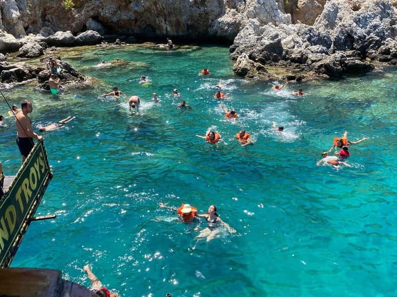 Alanya Relax Boat Tour with Caretta and Dolphin View - Caves, cliffs, and coastal photo stops