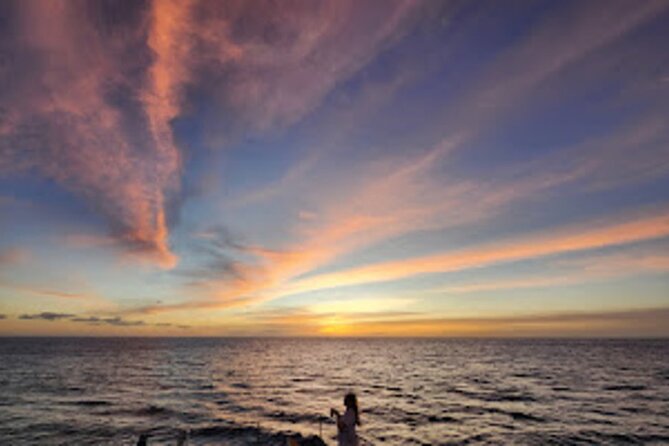 All-Inclusive Sunset Dolphin Watch and Snorkeling Cruise - Watching for spinner dolphins off Oahu’s west coast