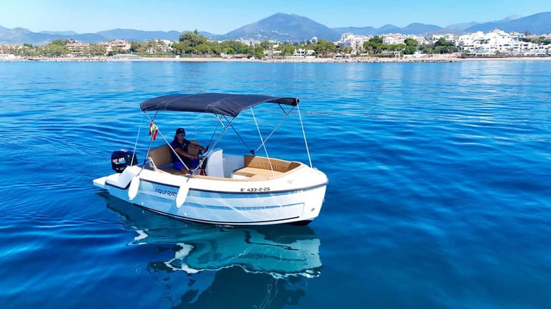 Benalmádena: license-Free Rent Boat for Dolphin Watching - Looking for dolphins from a small boat