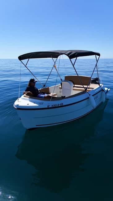 Benalmádena: license-Free Rent Boat for Dolphin Watching - Swimming, music, and sunset time