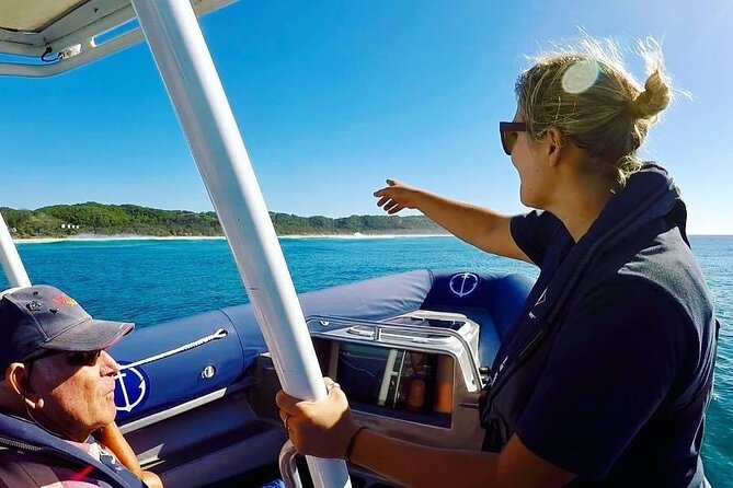Byron Bay Dolphin Tour - Ocean Safari - Cape Byron Lighthouse from an uncommon angle