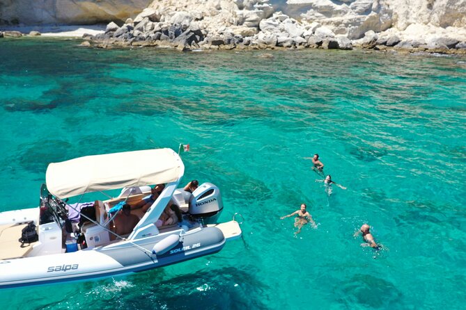 Cagliari Boat Tour 4 Stops .Possible Sighting of Dolphins - Gianni’s style is part of the attraction