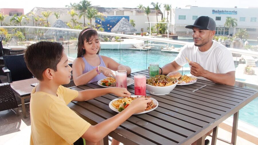 CANCUN: Dolphin Swim Adventure with buffet and soft drinks - Booking, languages, and cancellation flexibility