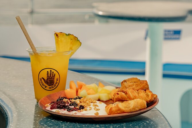 Deluxe Snorkel & Dolphin Watch Aboard a Luxury Catamaran from Kailua-Kona - BBQ lunch and the value of the $183.77 price