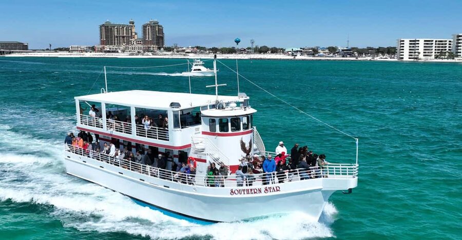 Destin: Dolphin Cruise aboard a Glass-Bottom Boat - Leaving the harbor with local commentary