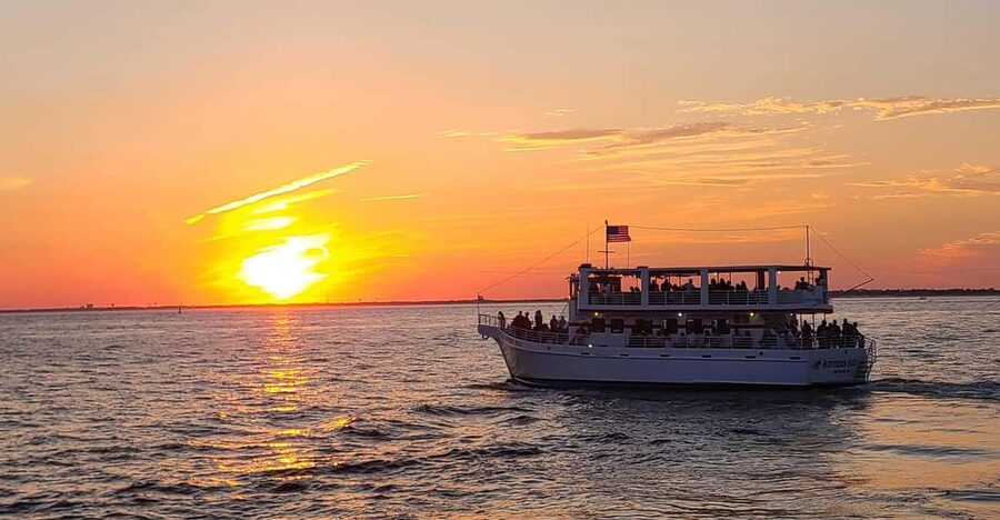 Destin: Sunset Dolphin Cruise - Passing East Pass and the white sand beaches