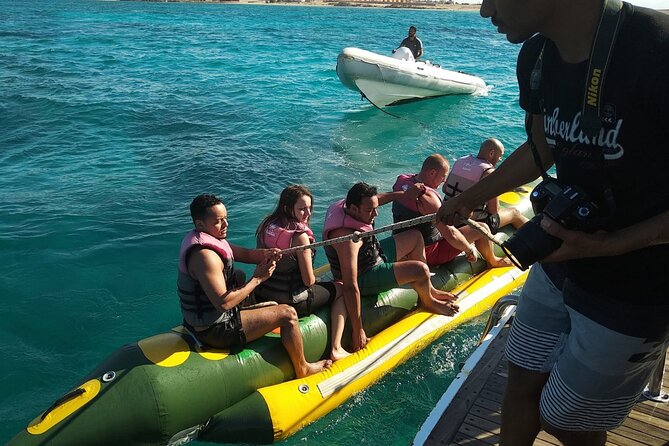 Dolphin tour & banana boat fun with snorkeling from Hurghada - Lunch, soft drinks, and life on the boat
