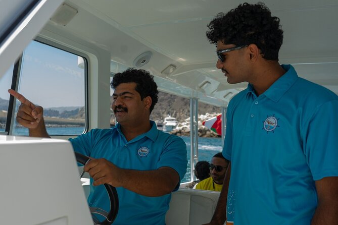 Dolphin Watching and Snorkeling Cruise Experience in Muscat - Looking for dolphins in their natural setting