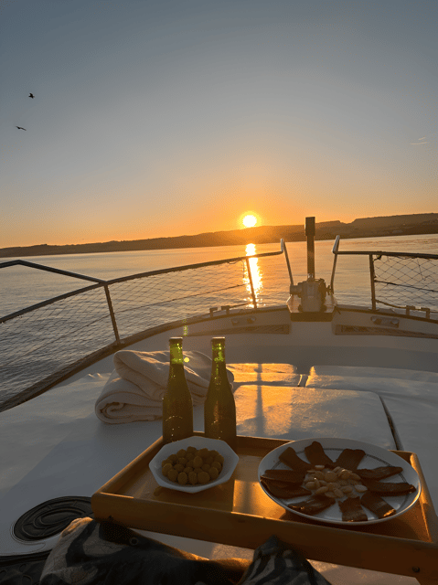Estepona: Dolphin Searching Sunset Cruise with Drink & Snack - Sunset from the water