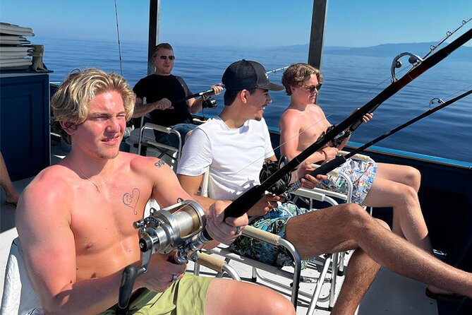 Fishing, Snorkelling & Dolphin Boat Tour - Watching for dolphins and whales