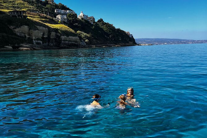 Fishing, Snorkelling & Dolphin Boat Tour - Snorkeling in open coastal water