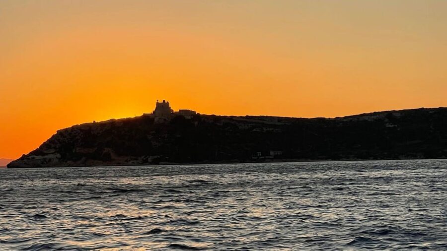 From Cagliari: sunset dolphin watching tour - Poetto Beach from the water