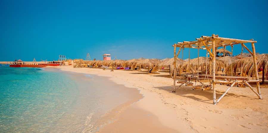 From Hurghada: Hula Hula Island Speedboat Tour with Dolphins - Morning, sunset, and pickup choices