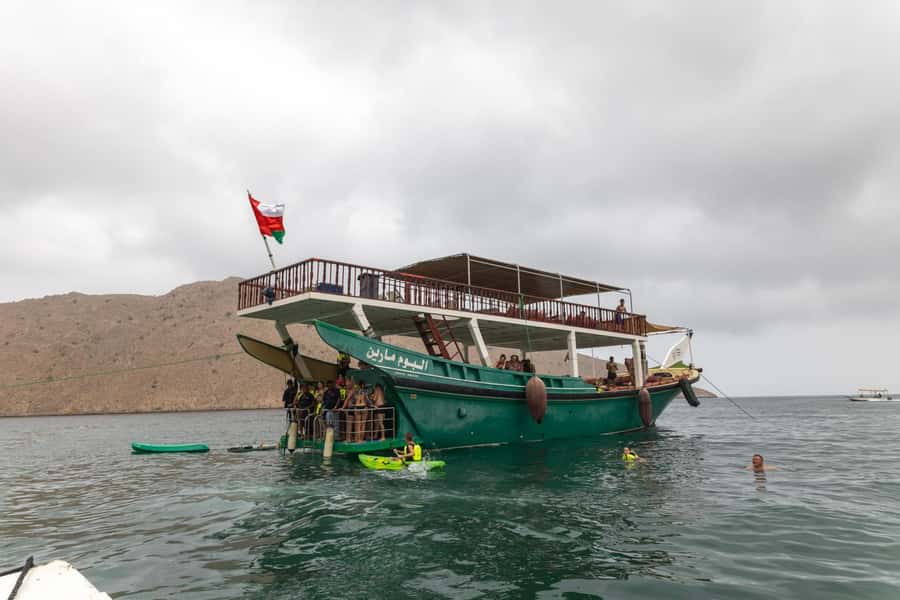 From UAE: Musandam Dibba Day Trip (Oman) - Boarding the traditional dhow in Dibba