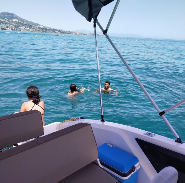 Fuengirola: Dolphin Watching Tour with Snacks and Drinks - Swimming away from Fuengirola’s shore