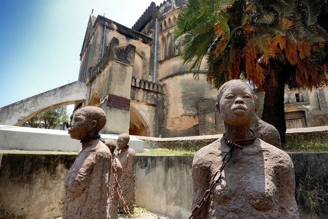 Full-Day Guided private Dolphins tour+ Monkeys + Stone town &spice Farm Zanzibar - Three hours in Stone Town’s narrow streets