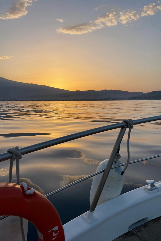 Giardini Naxos: Dolphin Searching Sunset Boat Tour - Sicilian aperitivo with pizza, fruit, and prosecco