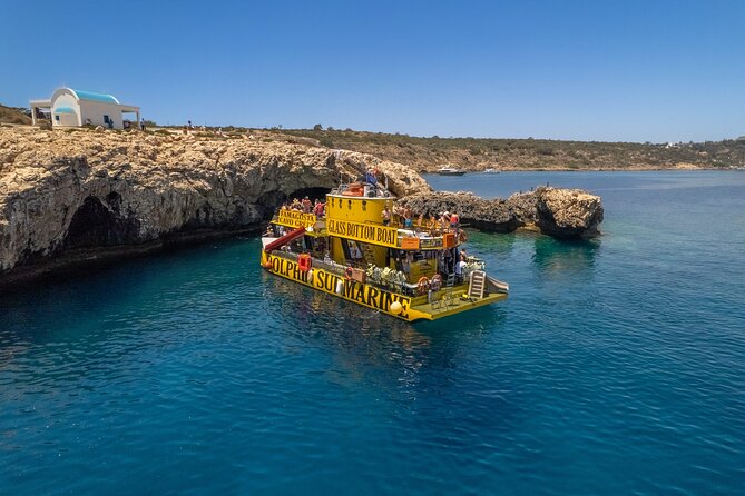 Glass Bottom Boat Dolphin Cruise to Blue Lagoon and Turtle Cove - Green Bay, the first swim in clear water