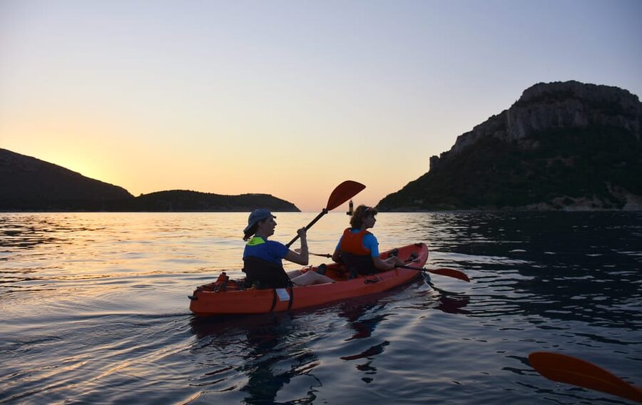 Golfo Aranci: Sunrise Dolphin Kayak Tour with Breakfast - Paddling toward Cala Moresca