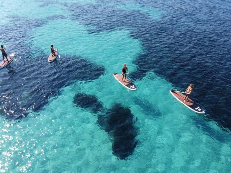 Golfo Aranci tour SUP Paddleboard Dolphin watching, aperitif - Finding the launch point at Baracconi Beach