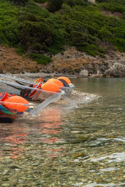 Golfo Aranci: traditional or transparent kayaks, dolphins, and aperitifs - Cala Moresca and the approach to Figarolo
