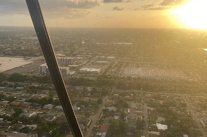 Guitar Hotel or Miami Dolphins Stadium Helicopter Tour - Sunset, night, and the doors-off option