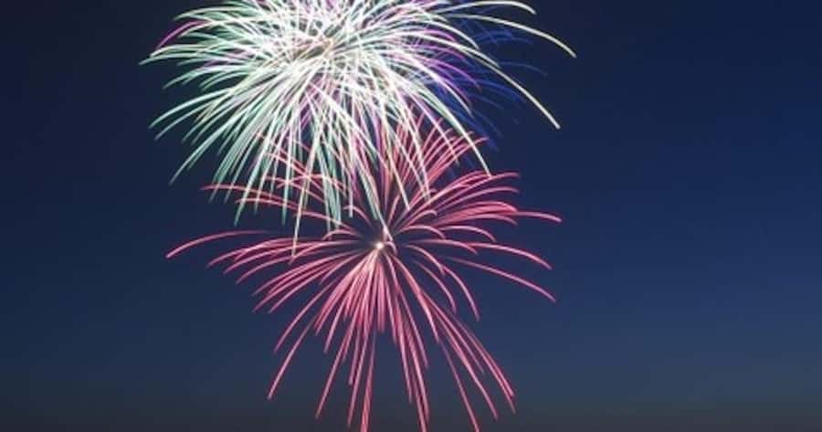 Hilton Head Island: Dolphin Tour at Sunset & Fireworks Show - Passing the candy-striped Harbour Town Lighthouse