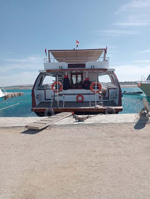 Hurghada: Dolphin & Coral Reef Snorkeling Tour with Lunch - Banana Boat Fun After the Reef Stops