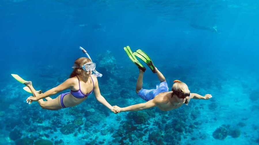 Hurghada: Dolphin Watching Boat Tour with Snorkeling & Lunch - Banana boat rides and the playful finish