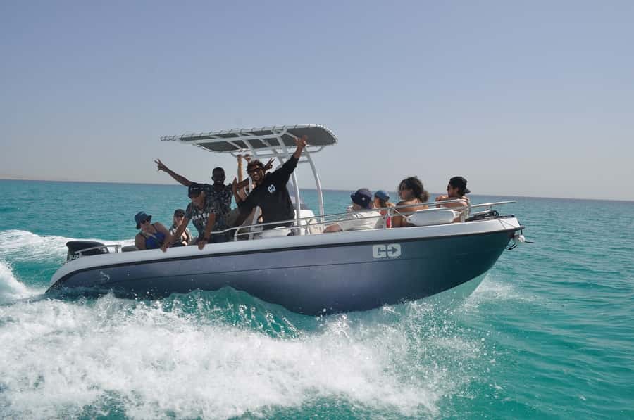 Hurghada: Orange Bay Dolphin Watching, Snorkeling & Lunch - Speedboat travel and the search for dolphins