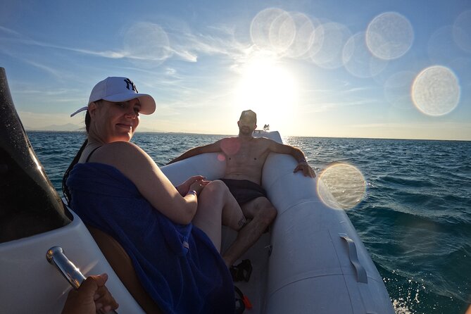 Hurghada Speedboat Dolphin Watching and Snorkeling - Searching for dolphins near Dolphin House