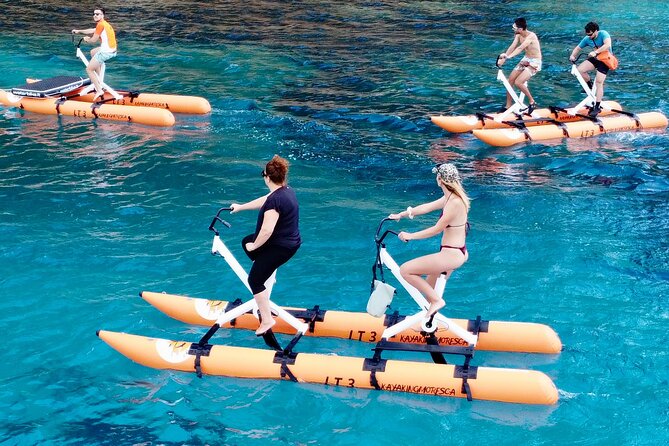 Hydrobike tour with aperitif and dolphins - Cala Moresca: one hour for swimming and snorkeling