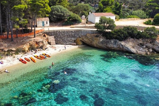 Kayak tour with aperitif and dolphins - Paddling out from Baracconi Beach