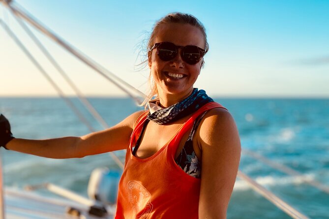 Key West Dolphin Watch and Sunset Sail on Catamaran - Raising the sails for sunset