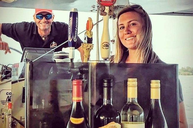 Key West Sunset Sail: Dolphin Watching, Wine, and Tapas - Sunset, champagne, and the final stretch