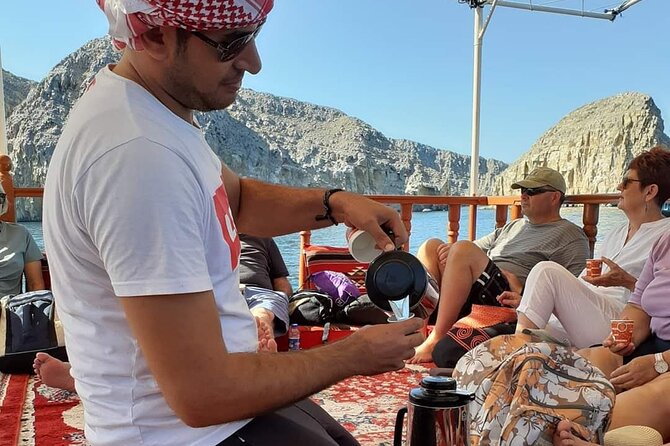 Khasab Dhow cruise-Half day with summing, dolphin watching - Coffee, fruit, and Omani hospitality on board