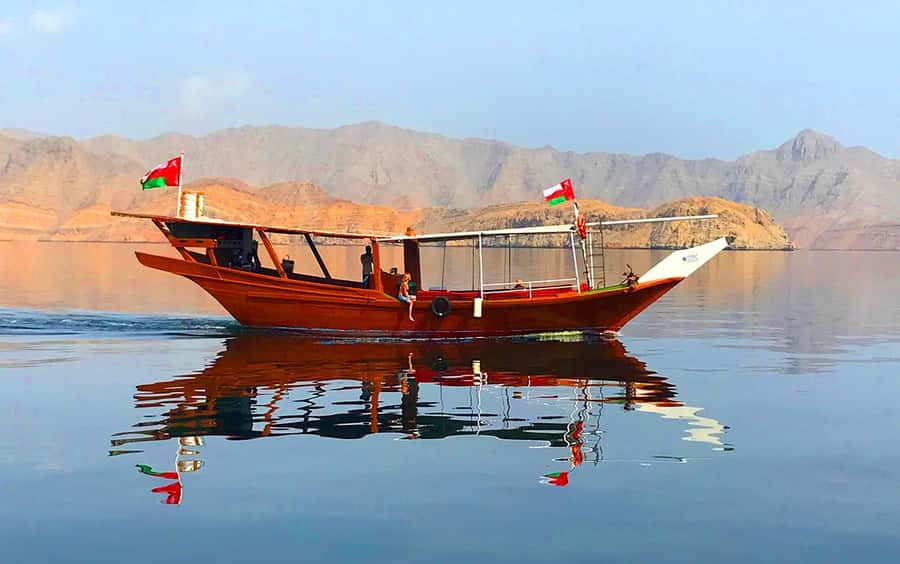 Khasab: Dolphin Watching Day Tour with Snorkeling & Lunch - Sailing past Nadifi and Qanah