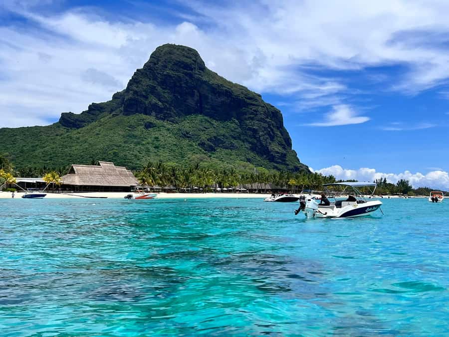 Le Morne: Private Boat Tour Dolphin-Watching & swimming - Taking in Le Morne from the boat