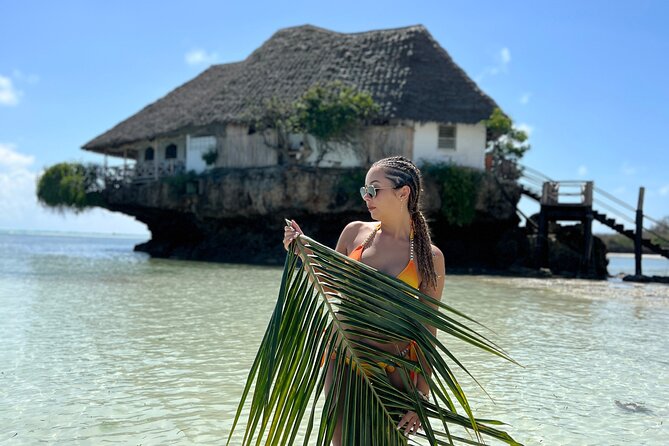 Luxury Tour to DOLPHINS, KUZA CAVE and THE ROCK RESTAURANT - Swimming with dolphins and snorkeling
