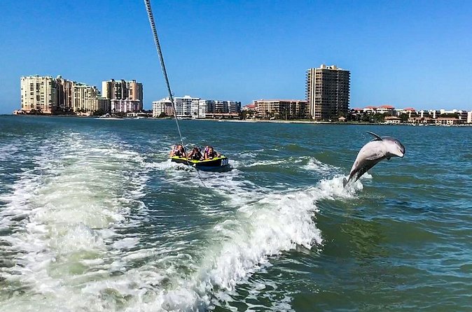 Marco Island Dolphin Watching & Tubing Adventure - Tubing in calm, shallow coastal water