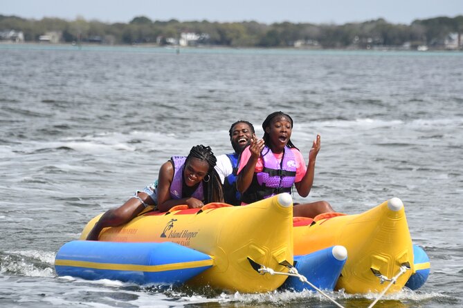 Private Banana Boat and Dolphin Spotting Experience - Looking for dolphins along the way