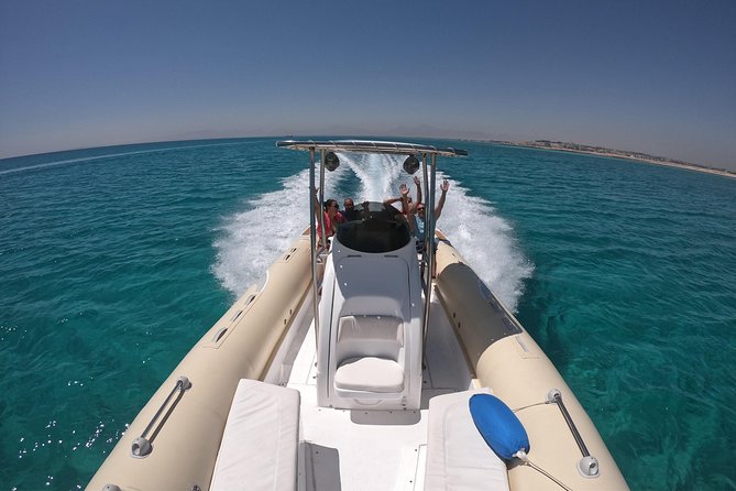 Private Dolphin Watching And Snorkeling Tour - Searching for dolphins in Hurghada waters