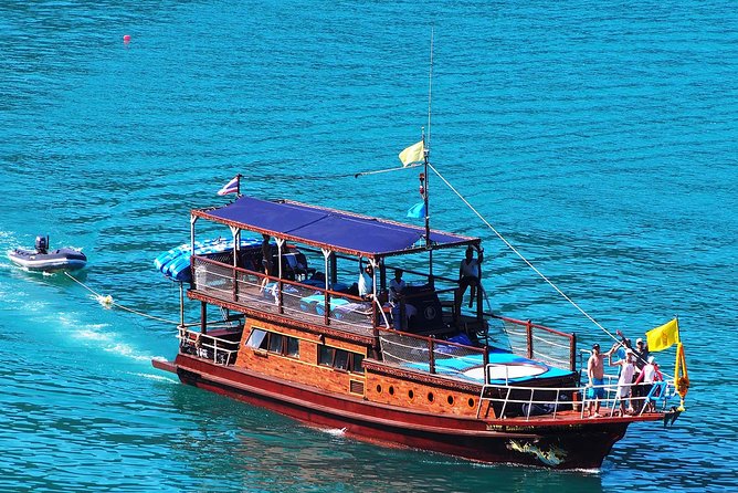 Private Full-Day Blue Dragon Yacht for Snorkeling Koh Tan & Visit Pink Dolphin - The Five Islands and Their Sea Caves