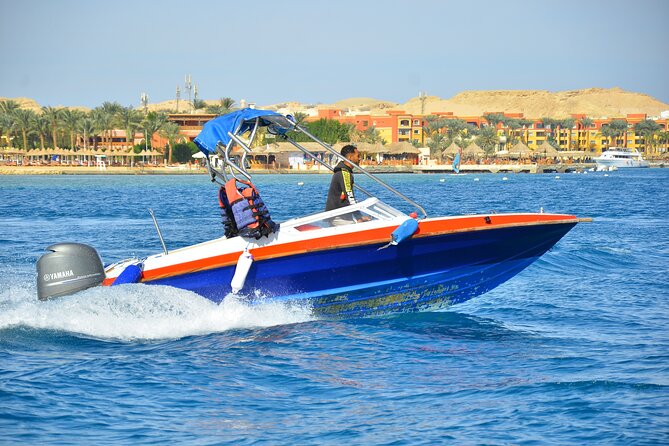 Private Speed Boat to DOLPHINS House & Water activities -HURGHADA - Snorkeling over coral and a shipwreck