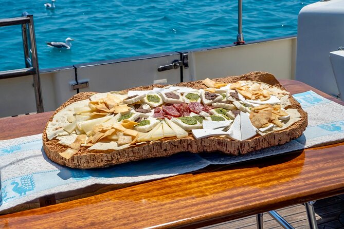 Private Tour with Historic Tugboat: Tavolara, Molara, Dolphins - What the food and drinks add to the value