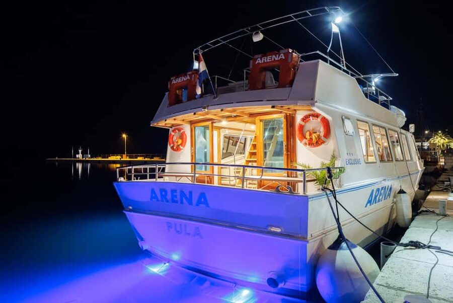 Pula: Brijuni Dolphins Sunset Cruise with Dinner and Drinks - Leaving Pula on the Arena boat