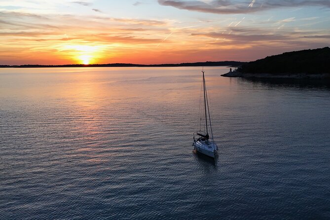 Pula: Private Golden Hour Sail - Dolphins, Drinks & Brijuni Views - Sailing Along Pula’s Coast Toward Brijuni
