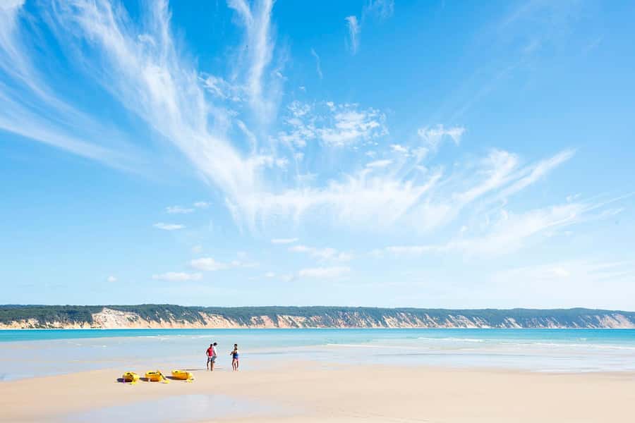 Rainbow Beach: Kayaking with Dolphins and Beach 4WD Tour - Seeing Double Island Point from the water